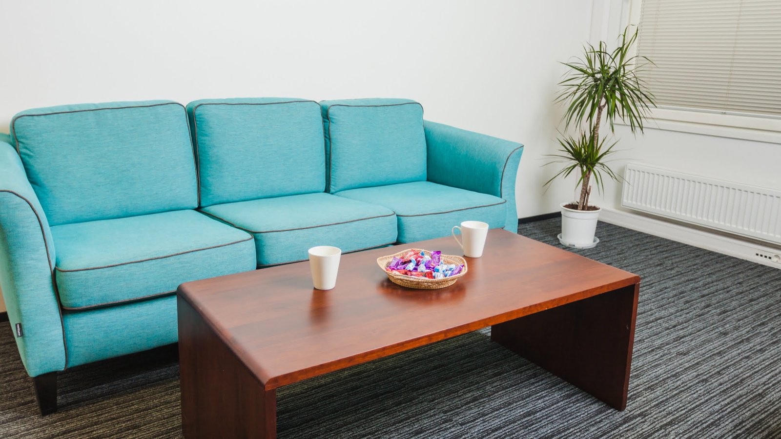 sofa-table-standing-gray-rug